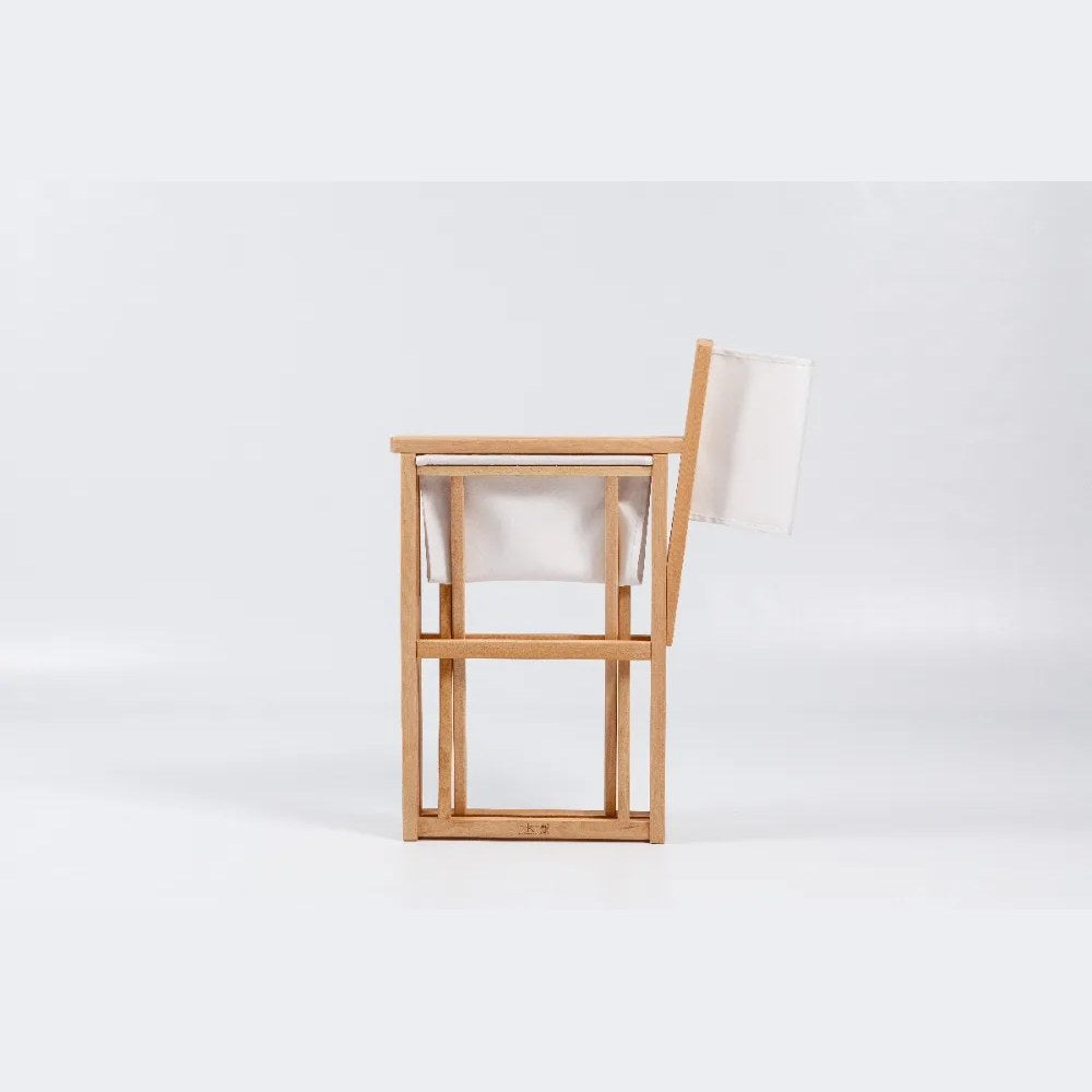 Fauteuil Mallorca XL vu de profil, toile tendue sur structure en hêtre